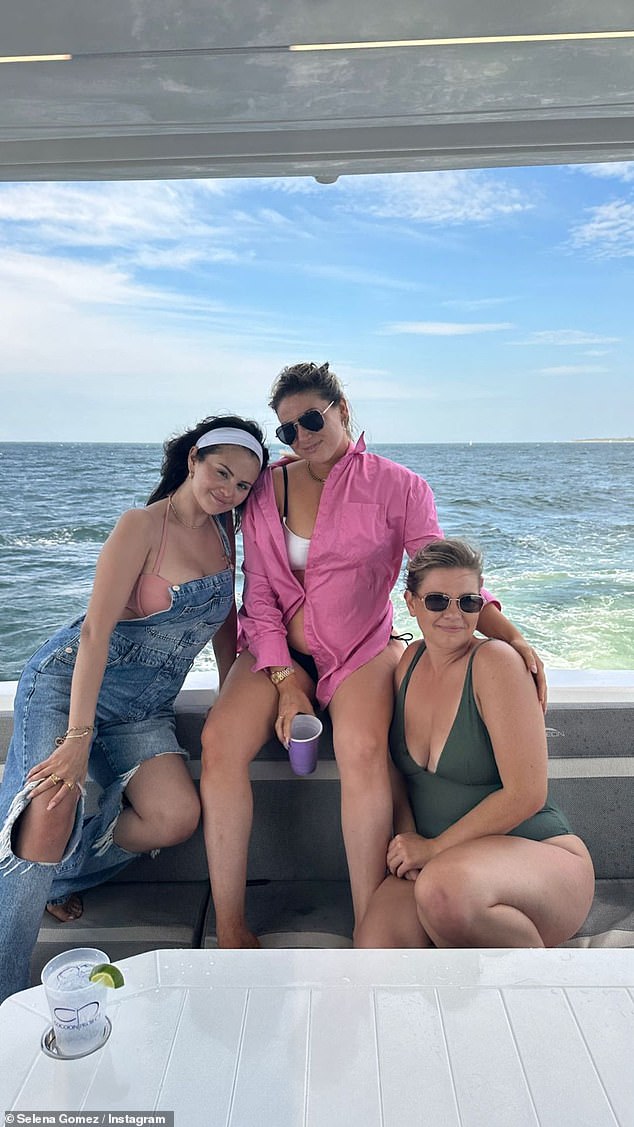 Happy life: As her friends posed for a selfie, the Rare Beauty founder showcased her natural beauty while sporting minimal makeup on her latest excursion