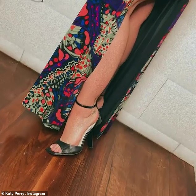 Giving inches: She flashed her legs in a VERY sexy thigh-split dress by Dundas while wearing killer heels