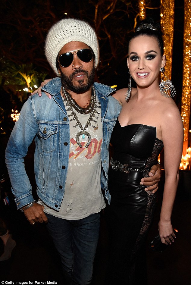Grin and bare it: Katy also posed with fellow musician Lenny Kravitz, who knows a thing or two about the dangers of not wearing underwear
