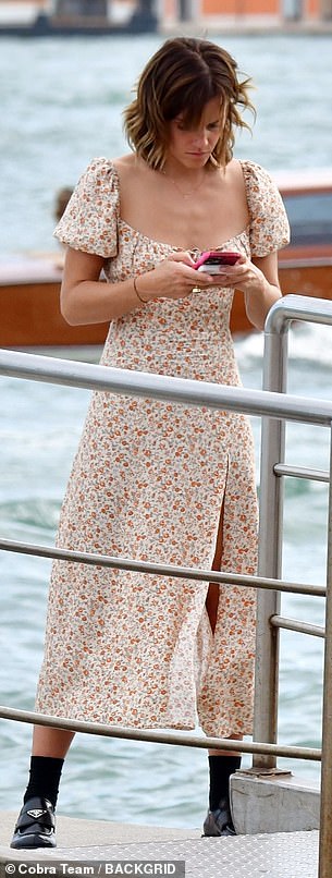 Relaxed: Emma looked chic as she took in the scenic sights of Italy