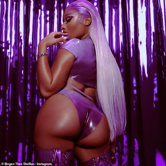 Long hair, don't care: The WAP rapper stayed on theme with a pin-straight purple wig that reached all the way down to her boots