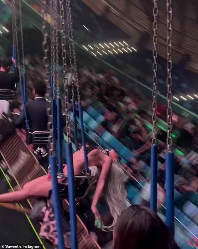 Weee! While there, the MTV Video Music Awards pre-show host took a spin around the carnival ride at the center of the fashion show to, once again, prove how able-bodied she is while wearing long nails