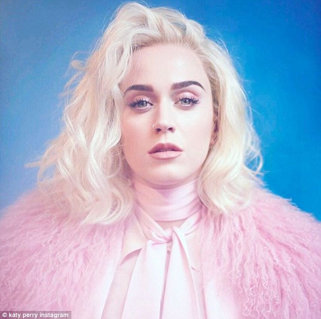 Fun 'do: The Grammy nominee showed off her blonde hair in an artsy Instagram pic this week to promote her new single 'Chained to the Rhythm' 