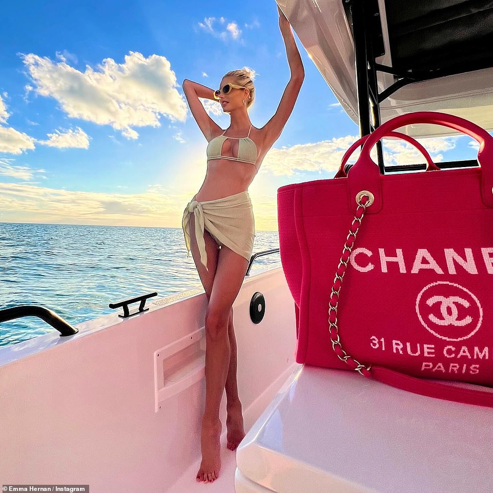 Selling Sunset star Emma Hernan showed off her fabulous figure when on a yacht in a new post to Instagram on Tuesday. The 33-year-old star was in a ɴuᴅᴇ ʙικιɴι top with a tied miniskirt as she lounged about a yacht during a vacation in Cabo San Lucas in Mexico