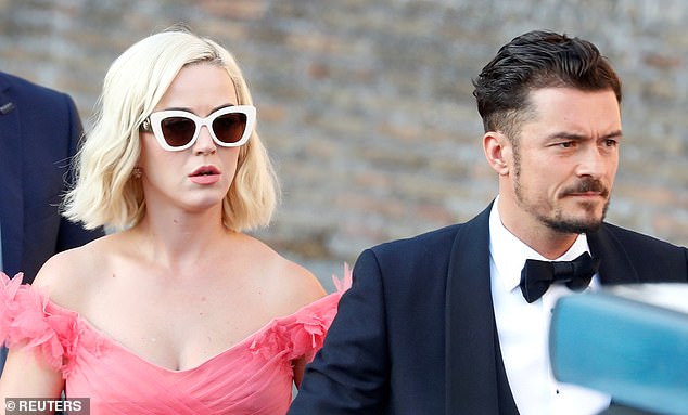 Glamorous: Katy Perry prepared to be a guest at her fashion designer pal Misha Nonoo's lavish Italian wedding as she attended the event with her fiancé Orlando Bloom in Rome on Friday