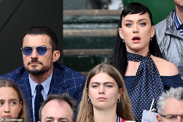 Captivated: Katy and Orlando Bloom took in the action on Wednesday