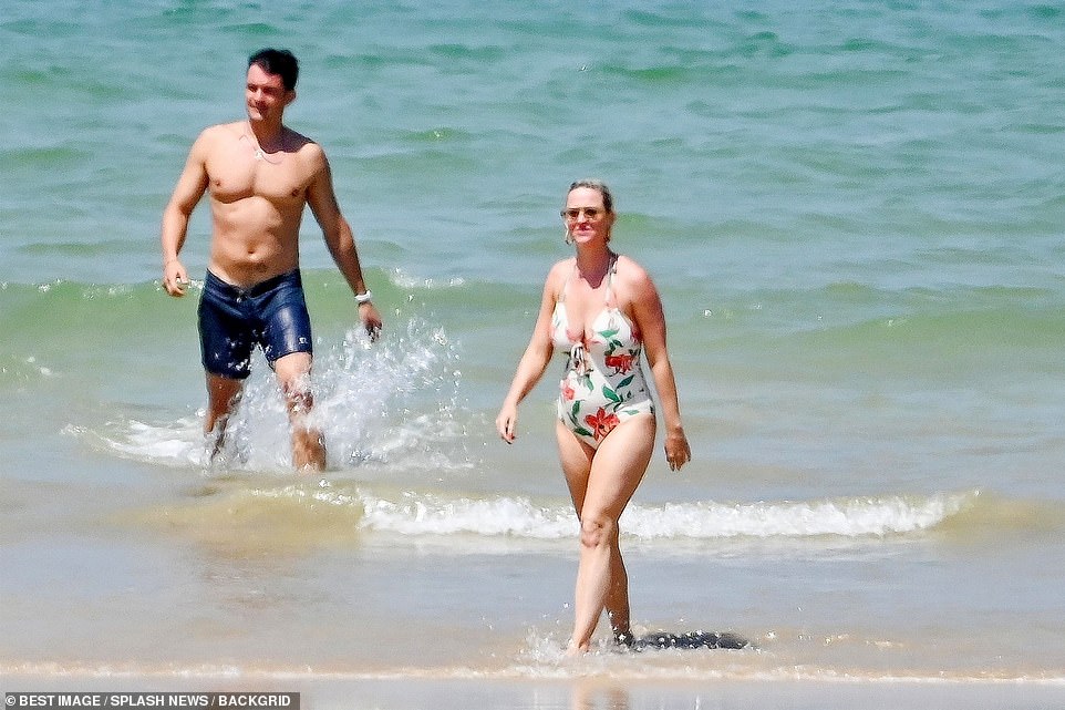 Soaking up the sun: Katy Perry and Orlando Bloom looked every inch the happy couple on Monday, as they were spotted soaking up the sunshine together on the breathtaking beaches of Île de Ré, France