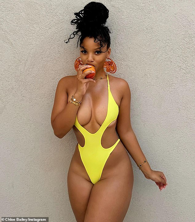 Chloe Bailey brought the heat as she posed in a series of pictures wearing a bright yellow one-piece bathing suit with cut-outs along the side