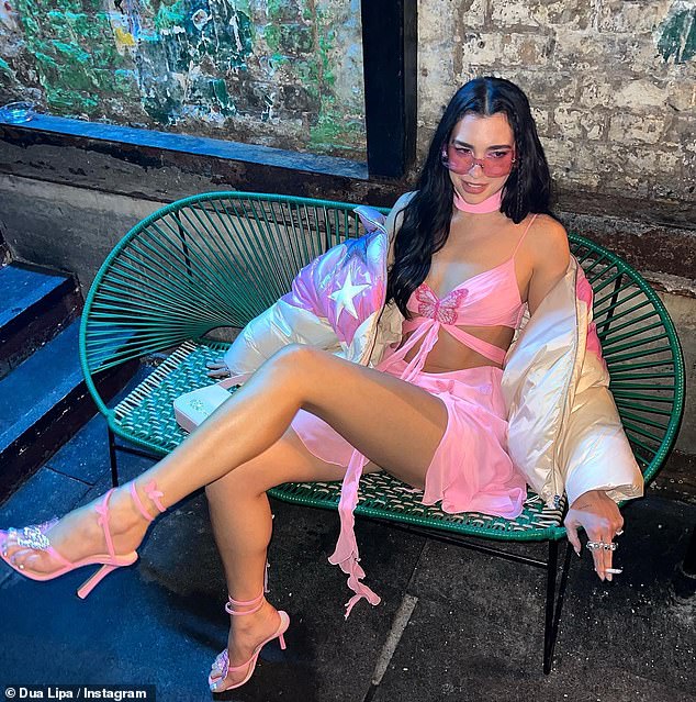 Pretty in pink: Dua Lipa wowed in a pink ʙuттerfly bra top and mini skirt in a slew of sizzling snaps shared on Instagram on Friday