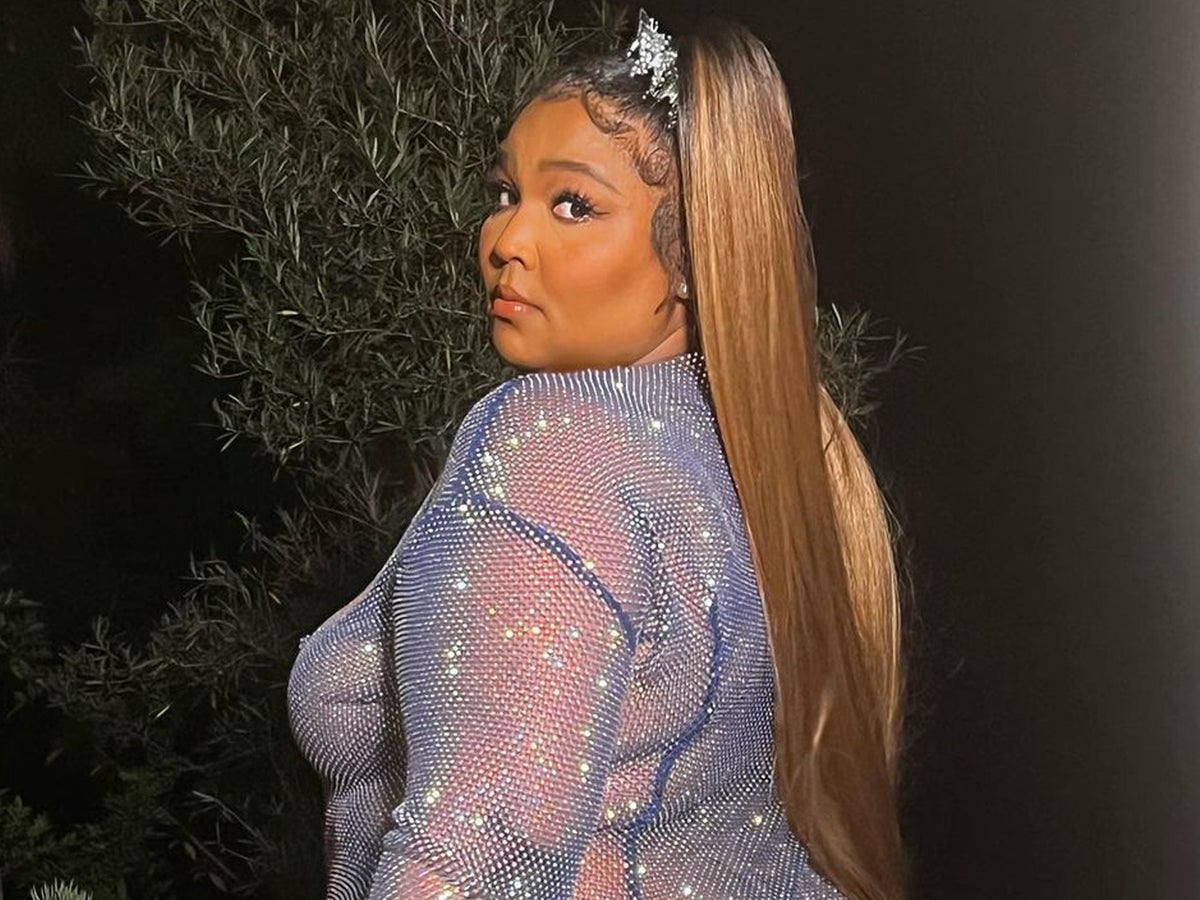 Lizzo dazzles in completely sheer dress at Cardi B's party | The Independent