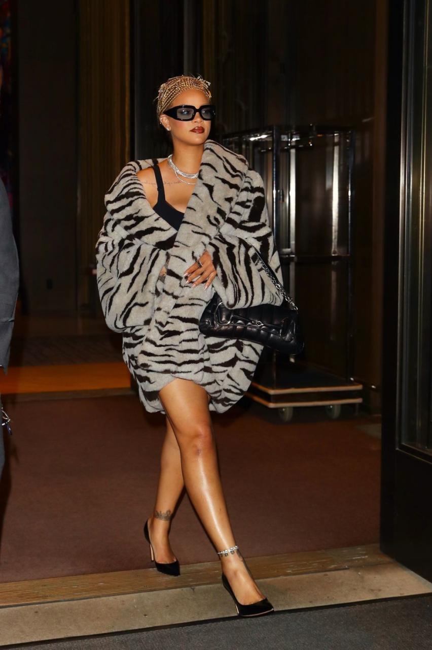 rihanna on may 31 wearing a zebra print jacket and minidress