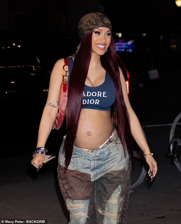 Pregnant Cardi B put on a brave face as she stepped out in amid her ongoing divorce from Offset