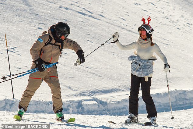 Harry Potter star Emma Watson brought a touch of seasonal cheer to the ski slopes ¿ by sporting a pair of bright red reindeer antlers on her helmet